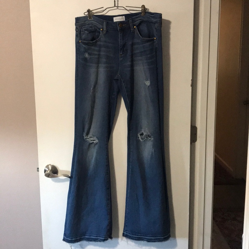 GREYWIRE New York flared raw hem jeans